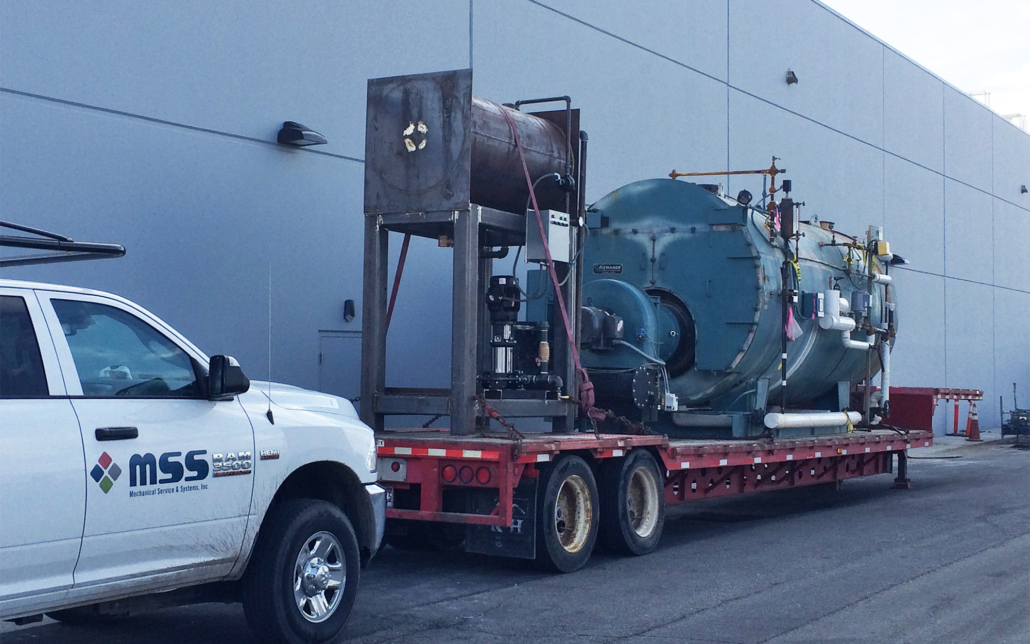 Mss Truck In Front Of Boiler On Trailer