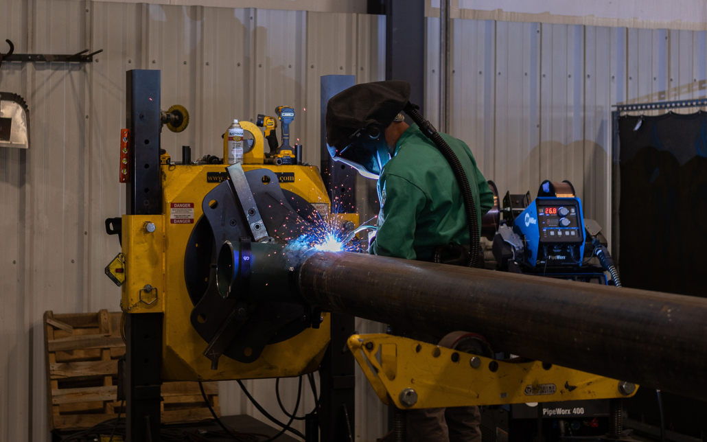Man Wearing Mask Pipe Welding